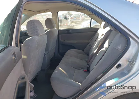 2002 Toyota Camry Le from USA, damaged, VIN 4T1BE32K52U100273